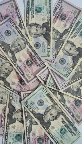 American or US dollars in form of a bunch of fifty and twenty dollar bills - money in the USA