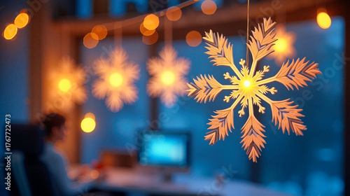 Cozy office setting with hanging Christmas snowflakes and warm bokeh lights in the background. Christmas atmosphere creates a festive feel for end-of-year celebrations in office spaces.