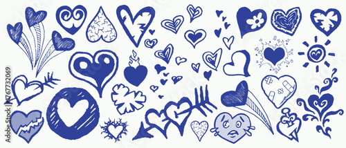 Collection of various blue handdrawn heart shapes and symbols, isolated on a