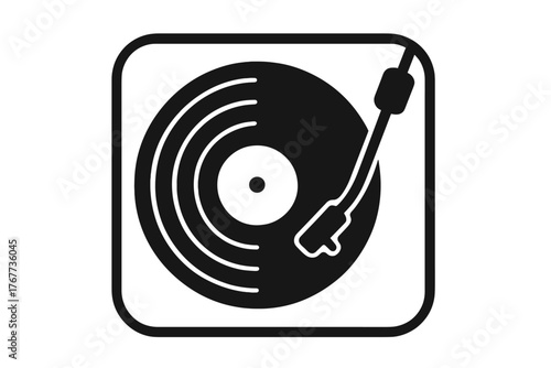Classic vinyl record spinning on a turntable in minimalist black and white style