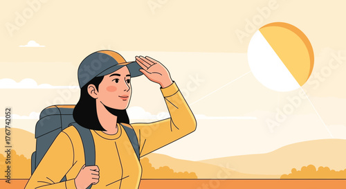 A Hiker Gazes at the Sun While Exploring the Beautiful Distant Terrain