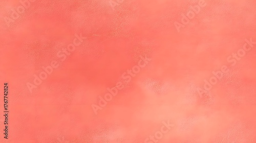 Textured surface displays a vibrant coral pink color with subtle light variations