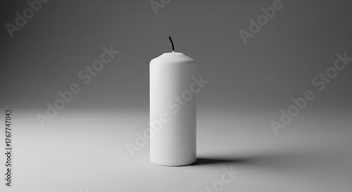 Unlit white pillar candle standing vertically on a minimalist gray surface.
A perfectly centered, medium-angle studio shot of a tall, cylindrical, unlit white wax pillar candle