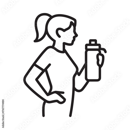 Woman in athletic wear holding a water bottle after a workout