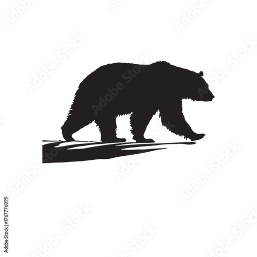 Silhouette of a powerful brown bear walking calmly isolated on white