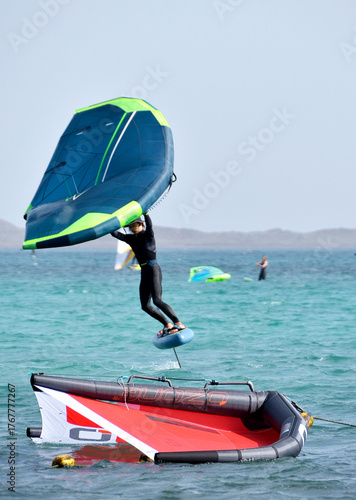 kitesurfer surfing on Atlantic ocean in Corralejo, Fuerteventura, Canary islands, Spain