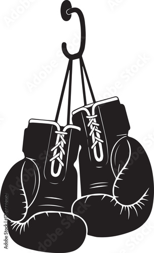 Classic boxing gloves hanging on a hook ready for a championship fight