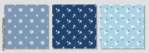 A set of seamless patterns with white flowers on a blue background
