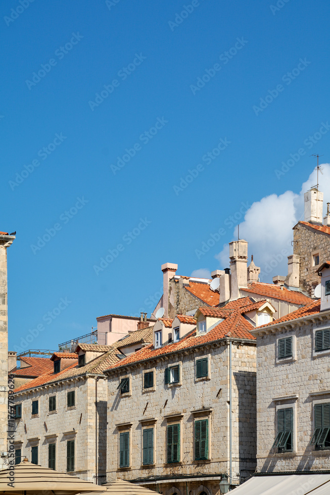 Obraz premium Architectural details of historic buildings in Dubrovnik. Famous tourist destination on the Adriatic coast and a UNESCO heritage site in Croatia.