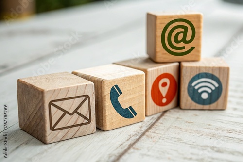 contact us icon email, address, phone, on wood cube, customer service and support for self quarantine business working at home, Telecommuting, Teleworking.