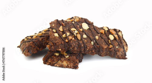 Honey bars with peanuts on white background