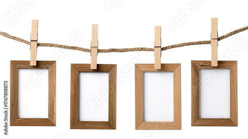 Five monochrome landscape photos hang on a clothesline