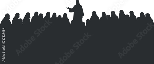 Silhouette of a speaker addressing a crowd during an event or presentation.