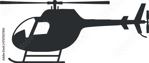 Silhouette of a helicopter in flight showcasing its rotor and streamlined design.