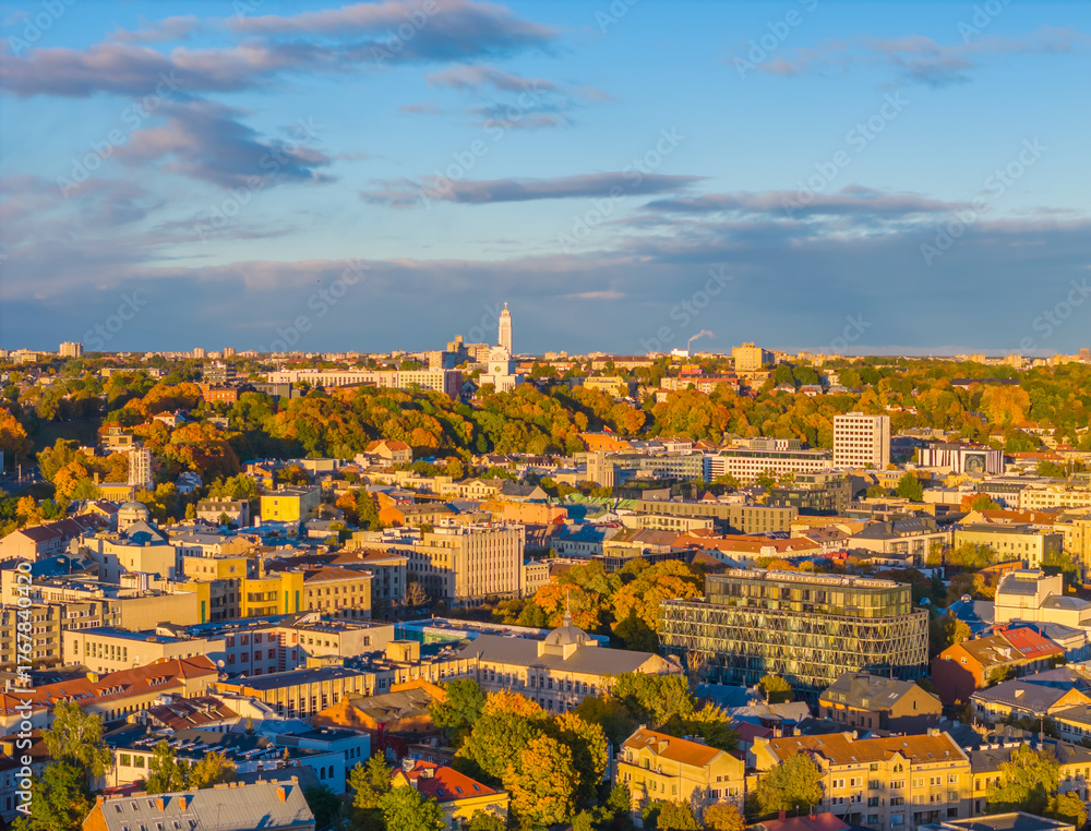 Obraz premium Kaunas old town and modern new city center in autumn, Lithuania. Aerial drone view on golden hour