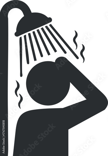 A person taking a shower enjoying a refreshing experience with water and steam.