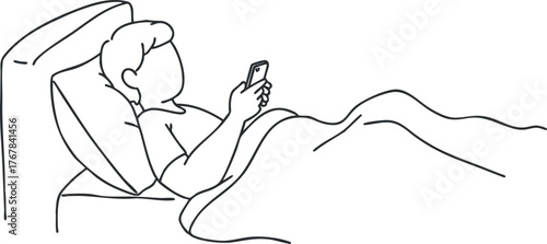 A person relaxed in bed using a smartphone at night, showcasing modern digital habits.
