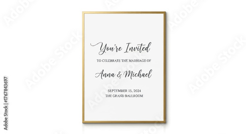 A framed wedding invitation with elegant calligraphy script for Anna and Michaels marriage ceremony.