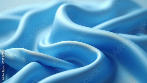 Close up macro view of flowing light blue satin fabric with soft folds and gentle curves creating a luxurious texture