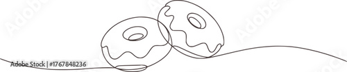 Two donuts with glaze and swirls pastry food