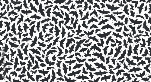A seamless pattern featuring black bird silhouettes on a white background for creative design.