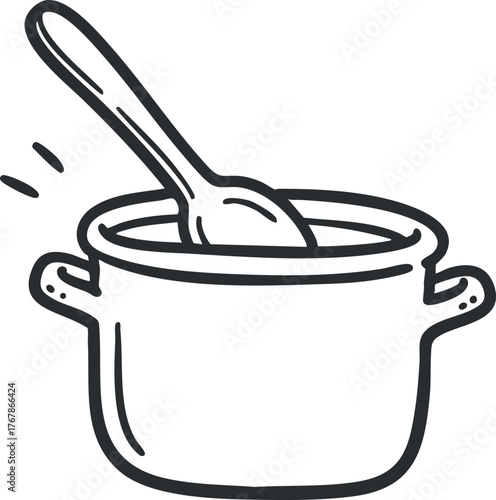 A simple cooking pot with a wooden spoon ready for stirring delicious homemade meals.