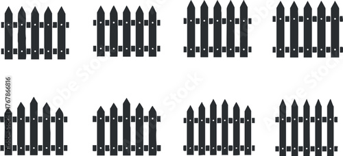 A pattern of black wooden fences ideal for garden and outdoor design projects.