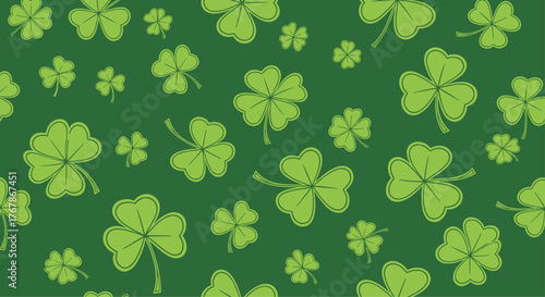 Seamless pattern of green clovers and shamrocks on a dark green background for St. Patrick's Day.