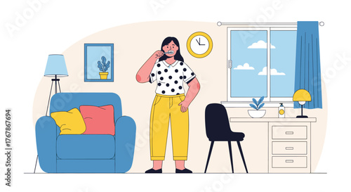 A young woman in casual clothes maintains her daily oral hygiene routine by brushing her teeth in her bright and comfortable home.