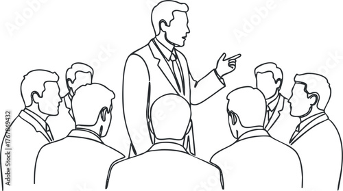 A group of professionals engaged in a discussion led by a speaker during a business meeting.