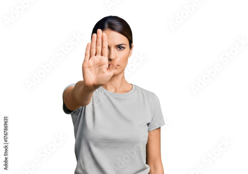 Young woman showing a ''stop'' gesture with her hand, on a transparent background, isolated