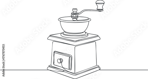 A vintage-style hand-operated grinder ideal for coffee or spices in a kitchen setting.