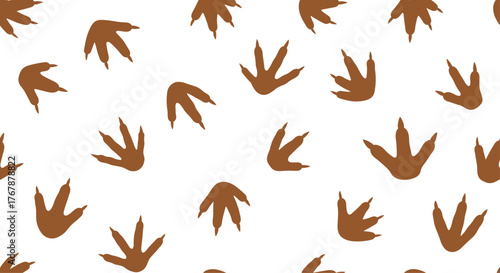 Seamless pattern of brown dinosaur footprints on a white background.