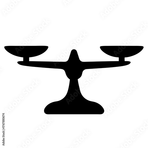 Silhouette of an antique apothecary balance scale used to weigh medicines