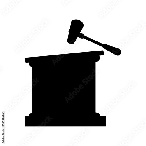 Black silhouette of a judge's gavel ready to strike a classical podium