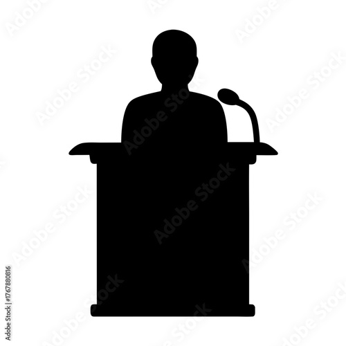 Silhouette of speaker at podium with microphone in dark black color