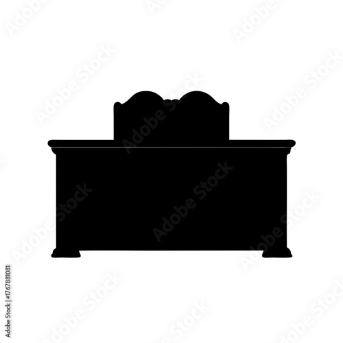 Silhouette of an ornate vintage vanity table with a decorative mirror