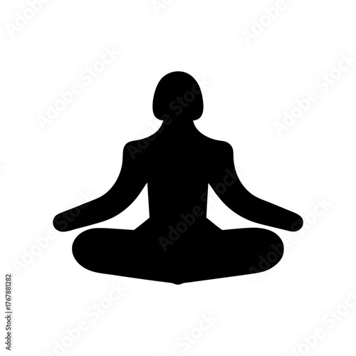 Silhouette of woman meditating in lotus position to achieve inner peace