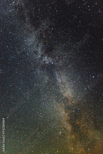Night sky filled with countless stars, showcasing the Milky Way galaxy in stunning detail, creating a breathtaking cosmic view of the universe's beauty and vastness