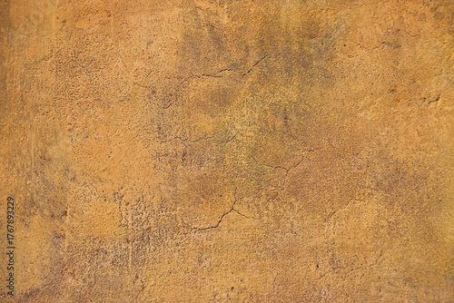Fényképezés Grunge yellow painted plaster wall background