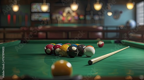 Billiard cues and colorful balls on a green billiard table. Entertainment and relaxation.