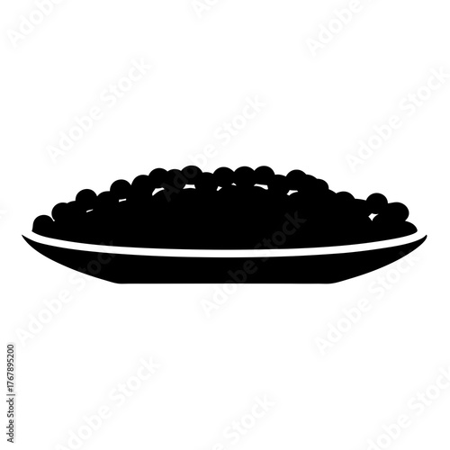 A plate overflowing with black beans, a culinary delight and vegan sustenance