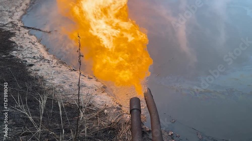 Ukraine, engineers at the Shebelinka gas field release and ignite problem gas and gas condensate into a special pit - a barn for safety