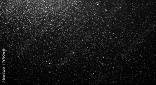 An endless expanse of sparkling black. This image features a textured, shimmering darkness, reminiscent of a star-studded night sky or a field of glittering grains.