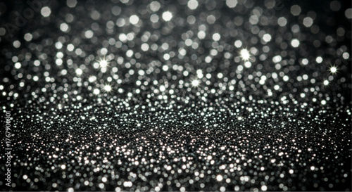Sparkling black glitter creating a captivating surface texture, perfect for evoking a sense of glamour and opulence. Its reflective nature catches and scatters light.