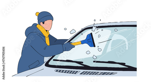 Person scraping ice off car windshield in winter season  