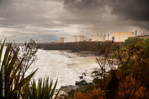 An Industrial Area Of Hawaii Offers A Unique Glass Sand Beach and Monk Seal Sightings. These tanks are used by Island Energy Services to store and distribute fuel to other islands.
