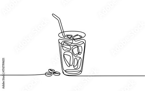 a glass of iced coffee with a straw and coffee beans nearby, symbolizing refreshment and café culture.