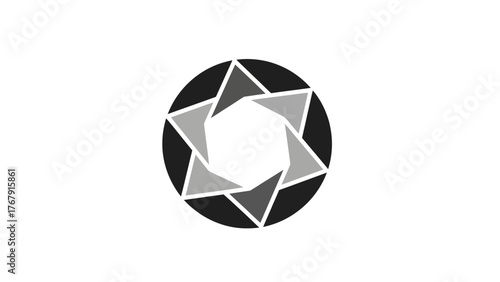 A black and white graphic featuring a circular aperture with grey, dark, and light triangles