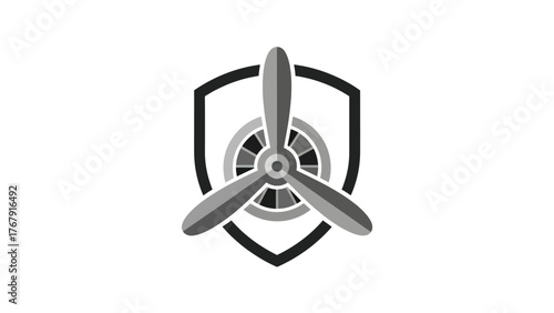 A grayscale logo of a propeller and a turbine within a shield shape